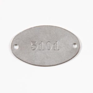 Sequential numbered stamped metal tags Serialized stamped metal tag with five-digit sequential numbering