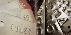 Embossed Serialized Tags Stamped Number Tags Side by Side Comparison