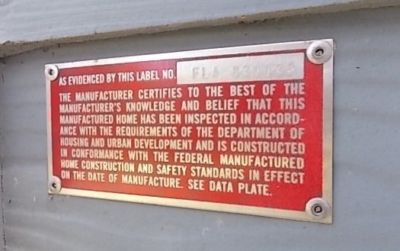 A sample manufactured home data plate and HUD tag