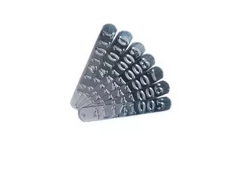 Image of am embossed metal tag made out of stainless steel material